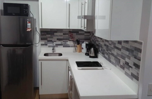 Makati House | 2BR Unit at Acqua Private Residences with Netflix + Wifi across Rockwell Makati