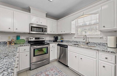 National Hills House | 3 bedroom, 2.5 bathroom patio home with an inground pool