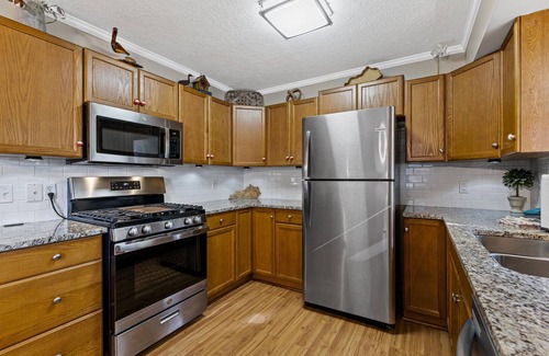 Cadiz House | 3 bedroom/2 full bath lakefront home with gentle slope to private covered dock