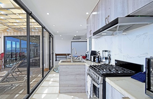 El Sargento House | 3 bedroom, 3 bath premium repurposed shipping container home with a Bullfrog X8 premium hot tub. Daily housekeeping (except Sundays) available for no additional fee. Free use of inflatable SUPs, beach chairs, a large sun shade & other beach toys.