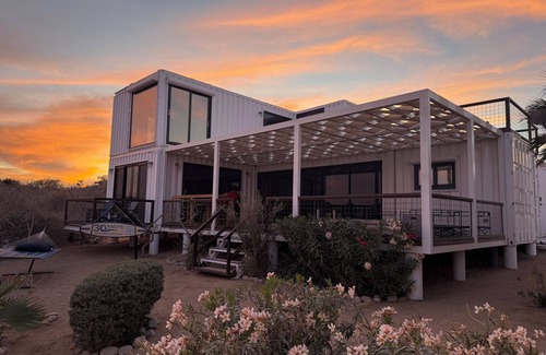 El Sargento House | 3 bedroom, 3 bath premium repurposed shipping container home with a Bullfrog X8 premium hot tub. Daily housekeeping (except Sundays) available for no additional fee. Free use of inflatable SUPs, beach chairs, a large sun shade & other beach toys.