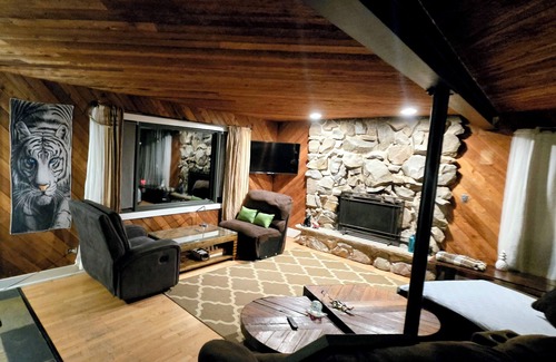 Lemont House | 3-bedroom hillside property in woods with fireplace and lake view