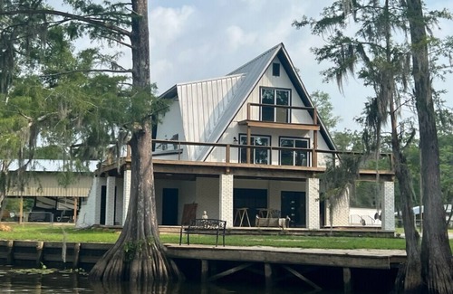 Burnside House | 3 levels, 3 bed room spacious waterfront home is located in the Maurepas Swamp