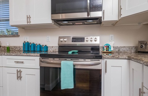 Crescent Beach House | 3 minute walk to beach! Spacious beach retreat with heated pool