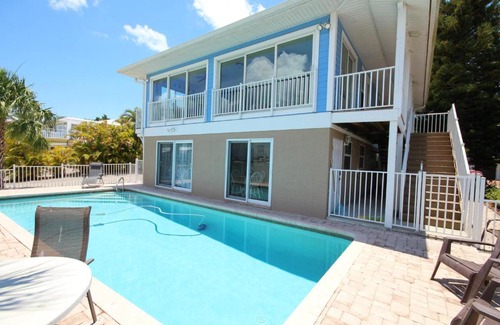Fort Myers Beach House | 331 Palermo Circle - Chic & cozy beach home with pool and bayfront view!