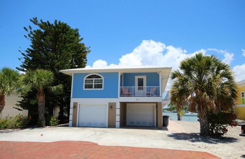 Fort Myers Beach House | 331 Palermo Circle - Chic & cozy beach home with pool and bayfront view!