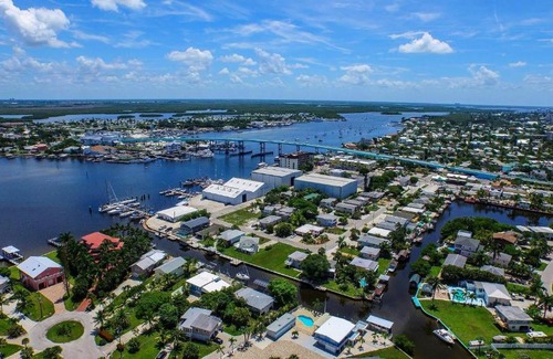 Fort Myers Beach House | 331 Palermo Circle - Chic & cozy beach home with pool and bayfront view!
