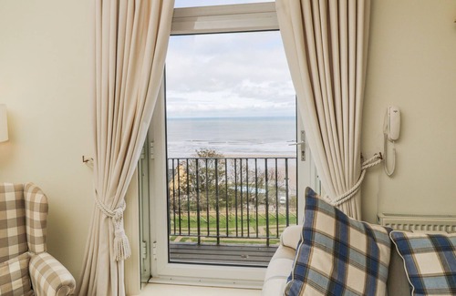 Muston Apartment | 38C THE CRESCENT, character holiday cottage, with a garden in Filey