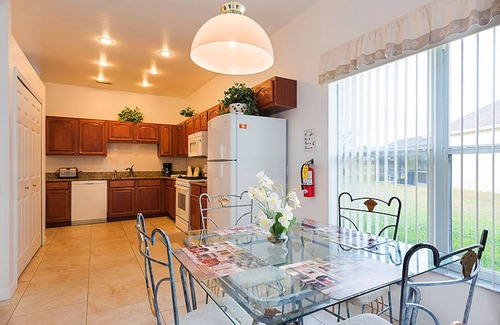 Crescent Lakes House | 4 Bedroom Home in Gated Area on the Lake withSolar Heated Large Pool with Spa