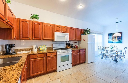 Crescent Lakes House | 4 Bedroom Home in Gated Area on the Lake withSolar Heated Large Pool with Spa