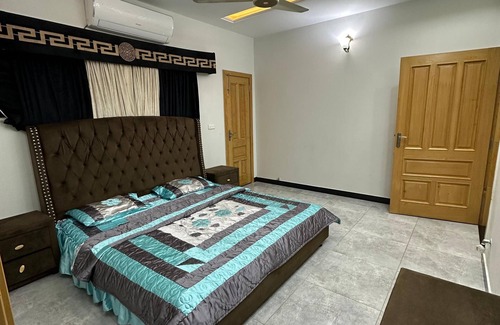 Islamabad Hotel | 4-bedroom hotel in brilliant Islamabad with WiFi,AC,Parking etc Enjoy your stay