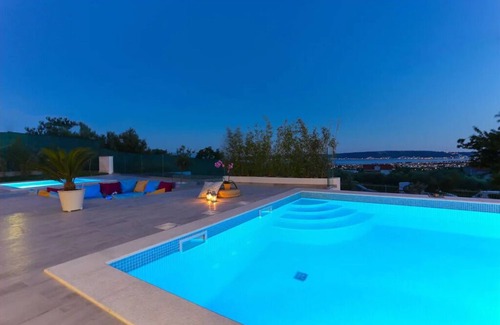 Kastel Stari House | 4 bedroom villa with heated pool, sea view and gym close to Split and Trogir.