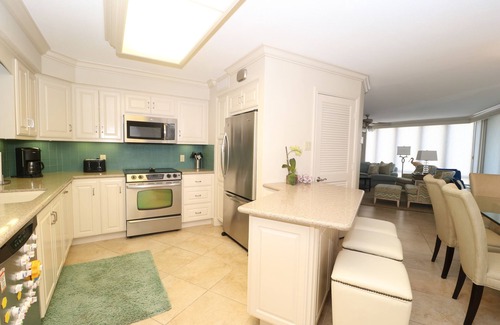 South Padre Island Condo | 4 BR Oceanfront Oasis: Luxury Amidst the Bustle w Heated Pool & Private Balcony