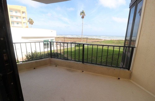 South Padre Island Condo | 4 BR Oceanfront Oasis: Luxury Amidst the Bustle w Heated Pool & Private Balcony