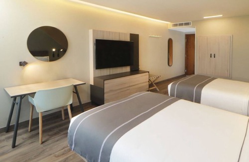 Providencia Hotel | 4 Tranquil Rooms - Upscale Area Near Cafés, Shops, and Colomos Park