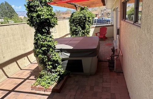 Sandia Ridge House | 40 MIN BIKE TO BALLOON FIESTA! Quirky MCM home with hot tub!