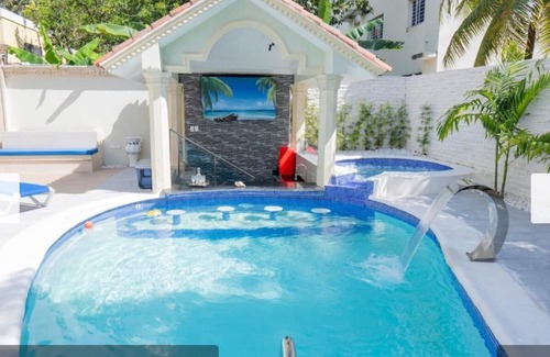 Santo Domingo Villa | 5 bed 5 bath Mansion in phenomenal Santo Dg Este with AC, EV WiFi and Bar Pool