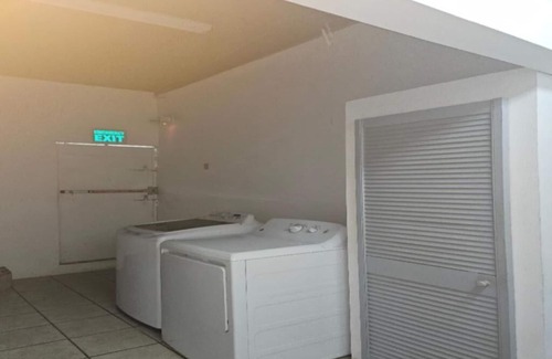 Woodbrook House | 5-bedroom, 2 baths house with WiFi, AC in Woodbrook. Near many mas camps.