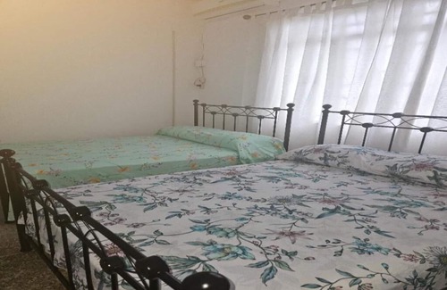 Woodbrook House | 5-bedroom, 2 baths house with WiFi, AC in Woodbrook. Near many mas camps.