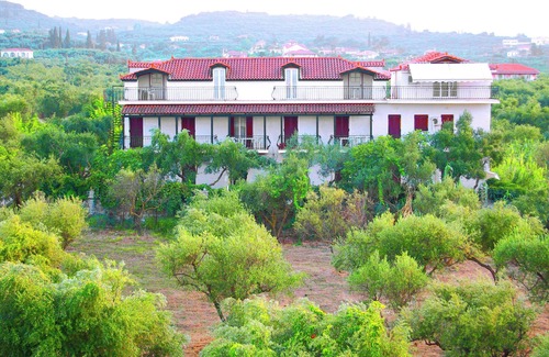 Neromilos Apartment | 5 Ground floor studios and apartments with private front garden for your team