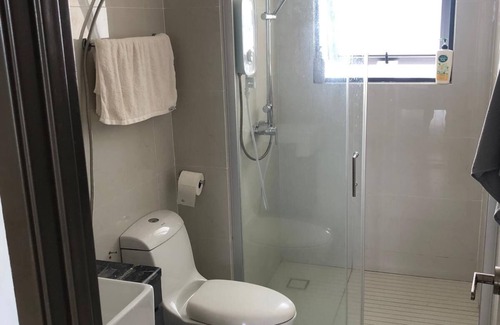Central District Condo | 5 mins to CIQ and the city center, next to the beach and shopping center