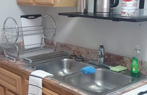 Crocus Hill Apartment | 5 minutes to the valley & Crocus Bay! condo with a beautiful private courtyard.