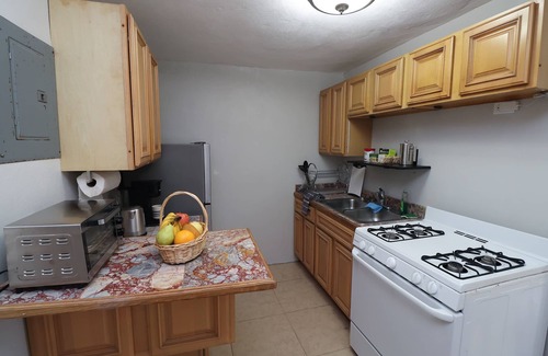 Crocus Hill Apartment | 5 minutes to the valley & Crocus Bay! condo with a beautiful private courtyard.