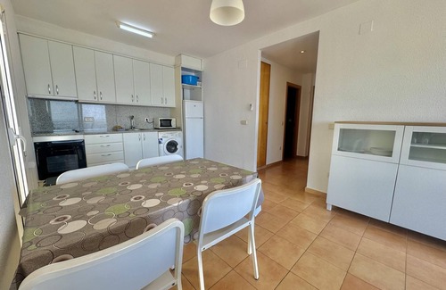 Almadraba-Canyelles Apartment | 6. Incredible views of the Bay of Roses, garden and community pool.
