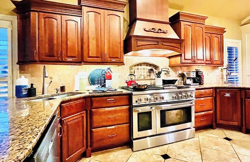 Overland Park House | 6BR Gated Home w Pool & Indoor Hot Tub- Chef’s Kitchen- 1.6 Acres Grand Piano