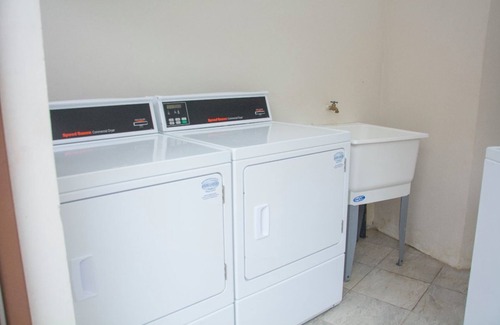 Coco Condo | 70m from the Ocean - Ground Level - Pool & Laundry