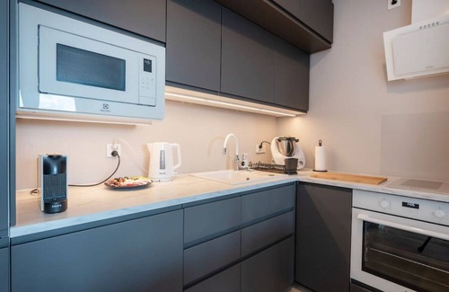 Baluty Apartment | 72m2 Manufaktura Prestige Suite with Parking by Rentujemy