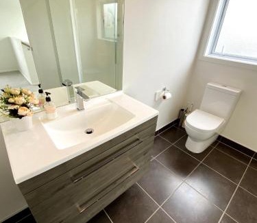 Browns Bay House | 7BR 3BH Beach Escape. 2 min to Browns Bay Beach