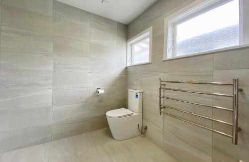 Browns Bay House | 7BR 3BH Beach Escape. 2 min to Browns Bay Beach