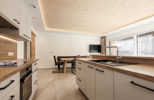 Bichlbach Apartment | 80m² modern vacation apartment with terrace, free bathing lake, 100m to the ski area