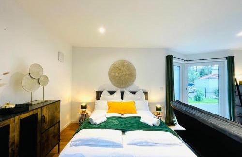 Rosenheim Apartment | 90m2 Loft I Kaffee I Terrasse I E-Parkplatz I 65' Smart TV