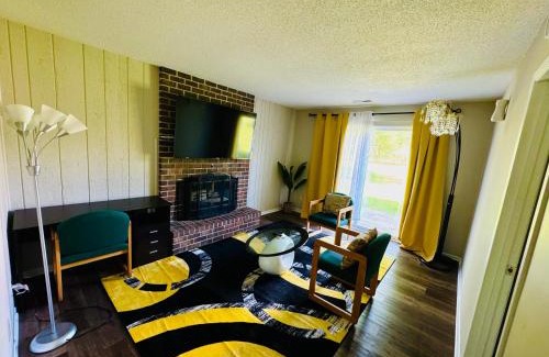 Maple Grove House | A Beautiful Self-contain room with a living room