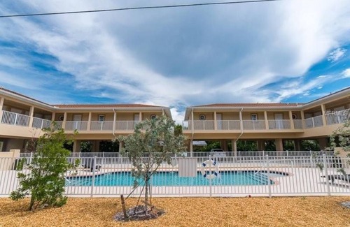 Englewood Condo | A Beautiful Sunset Awaits - Only a Few Steps to Beach