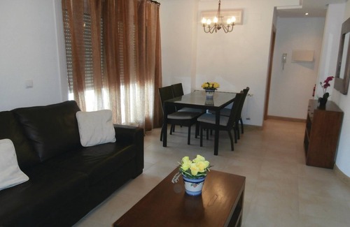 Roldan Apartment | A beautiful view of the lake and the golf course offers this modern equipped apartment.