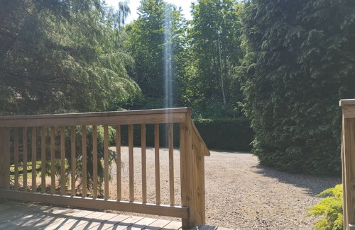 Lofthouse Cabin | A charming & traditional Scandinavian log cabin within a tranquil setting.