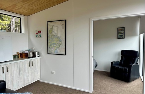 Moetapu Bay Cabin | A cosy two bedroom off-grid cabin, the perfect place to rest, relax & recharge.