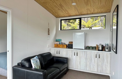 Moetapu Bay Cabin | A cosy two bedroom off-grid cabin, the perfect place to rest, relax & recharge.