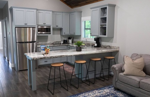 Livingston Cabin | A Cozy Getaway Right on the Water, Two Creeks Crossing Resort