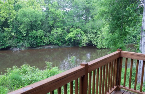 Livingston Cabin | A Cozy Getaway Right on the Water, Two Creeks Crossing Resort