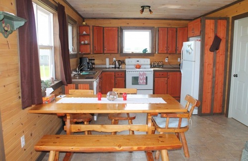 Sea View House | A cozy rustic cottage with a short walk to a fantastic beach in Seaview, PEI