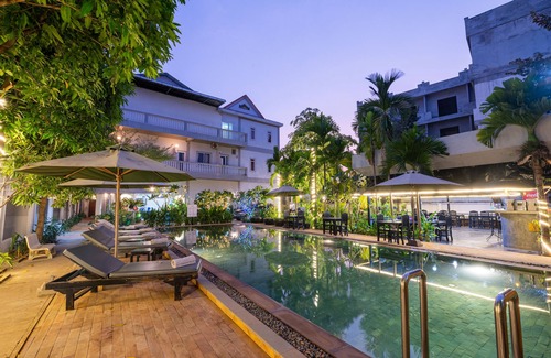 Siem Reap House | A family room with a private room suitable for a family of 5 members