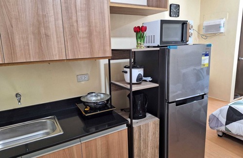 San Dionisio Condo | A Fully Furnished Studio Unit with Little Balcony ,Kitchenette, Dining & Living.