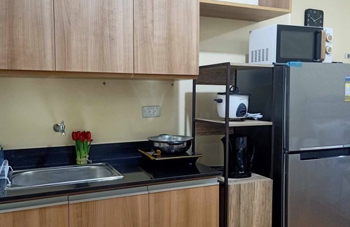 San Dionisio Condo | A Fully Furnished Studio Unit with Little Balcony ,Kitchenette, Dining & Living.