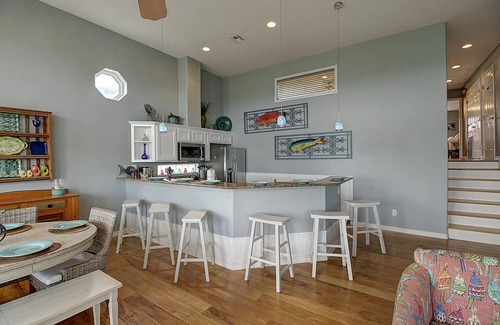 Port Aransas Condo | A fully remodeled condo overlooking a lush pond! Shared Pool! Boat Parking!