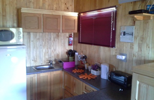 Sabie Cabin | A log style cabin having one major room
