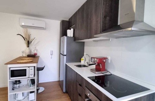 Pocitos Apartment | A modern loft with a smart key system, located close to a Mall and beaches.